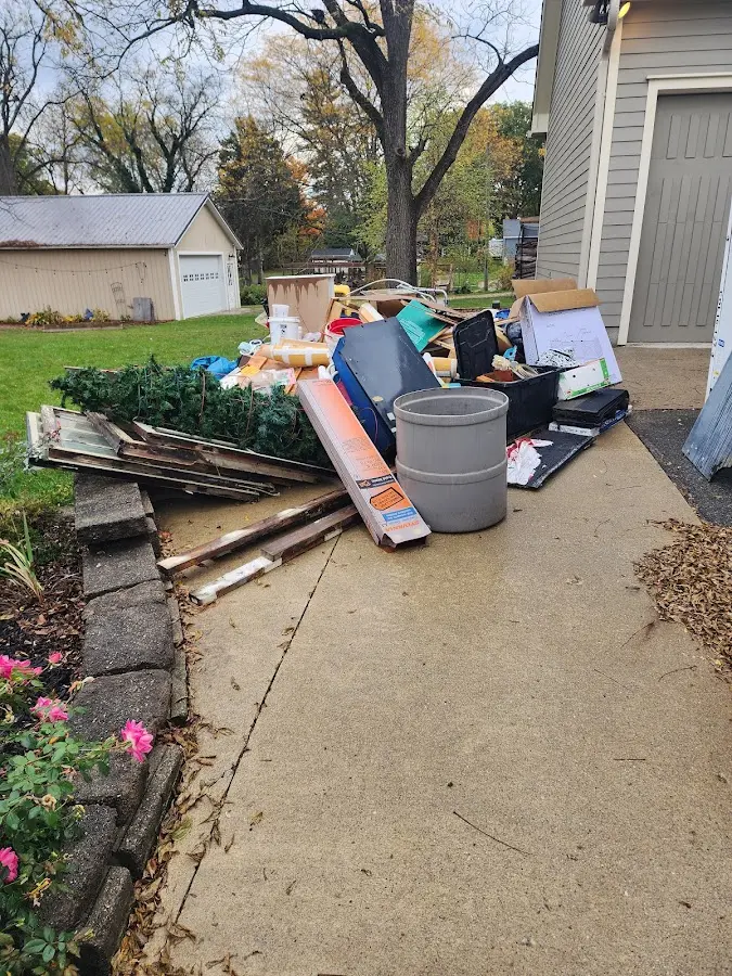 Dumpster being loaded with debris for 3 Yard Dumpster Rental in Philipstown